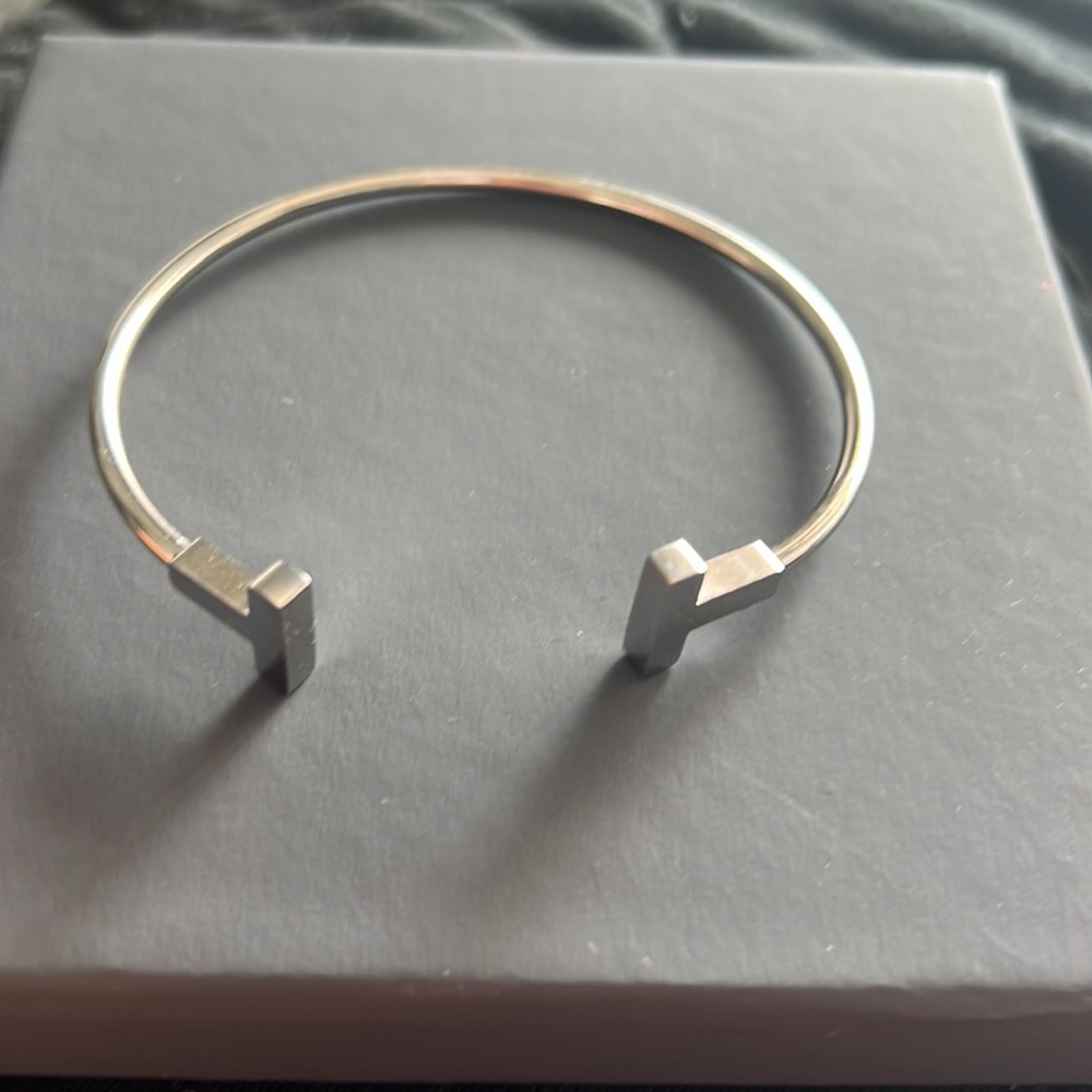 Silver bracelet stretches to fit wrist